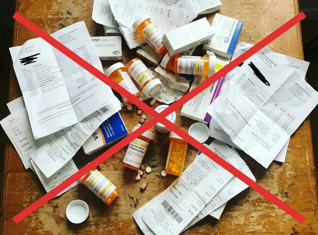 A table of prescription bottles and vet receipts, crossed out